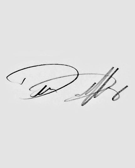 Word artist Dan Duffy’s signature on framed art of St. Joseph Hawk with handwritten phrase "The Hawk Will Never Die."
